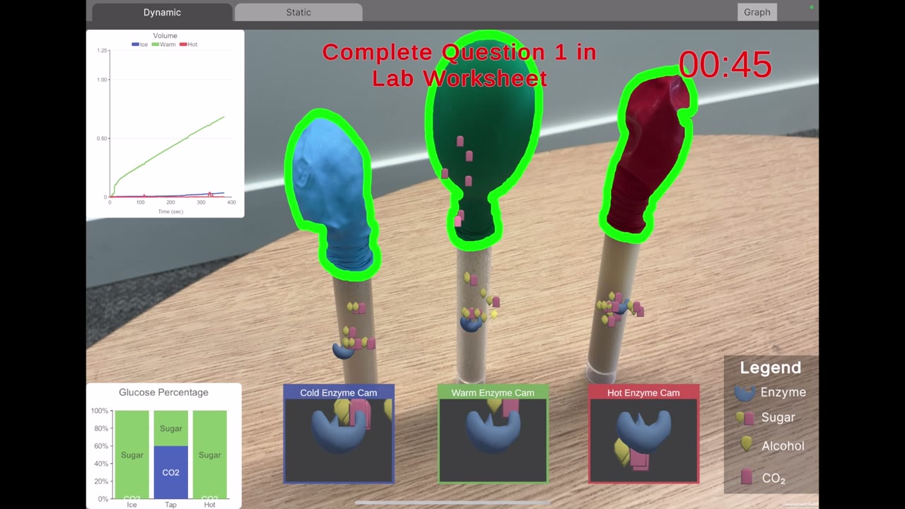 AR app showing enzyme activity above three real test tubes with balloons